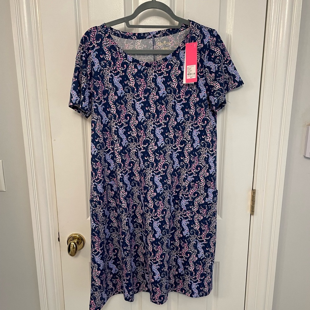 .  “On the Catwalk” print short sleeve dress